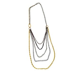Women’s Gold And Silver 18 Inch Multi-Chain Necklace With A Claw Clasp.